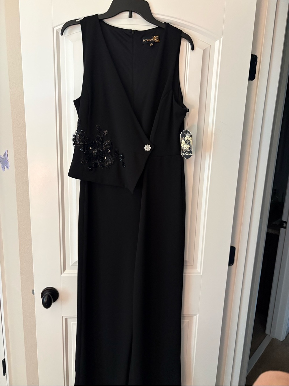 Elegant Black Sleeveless Jumpsuit with Embellished Waist